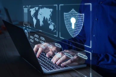 Threat Intelligence - Man using laptop