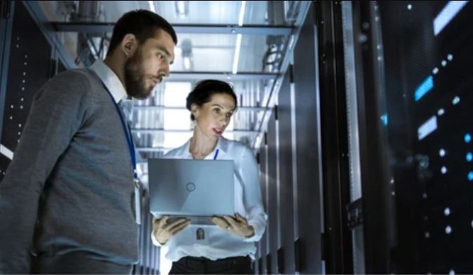 Peritus Digital Enterprise staff working in Data Centre